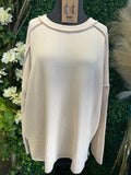 Raised rib raw edge boat neck long sleeve top