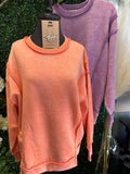 Acid wash exposed-seam fleece sweatshirt