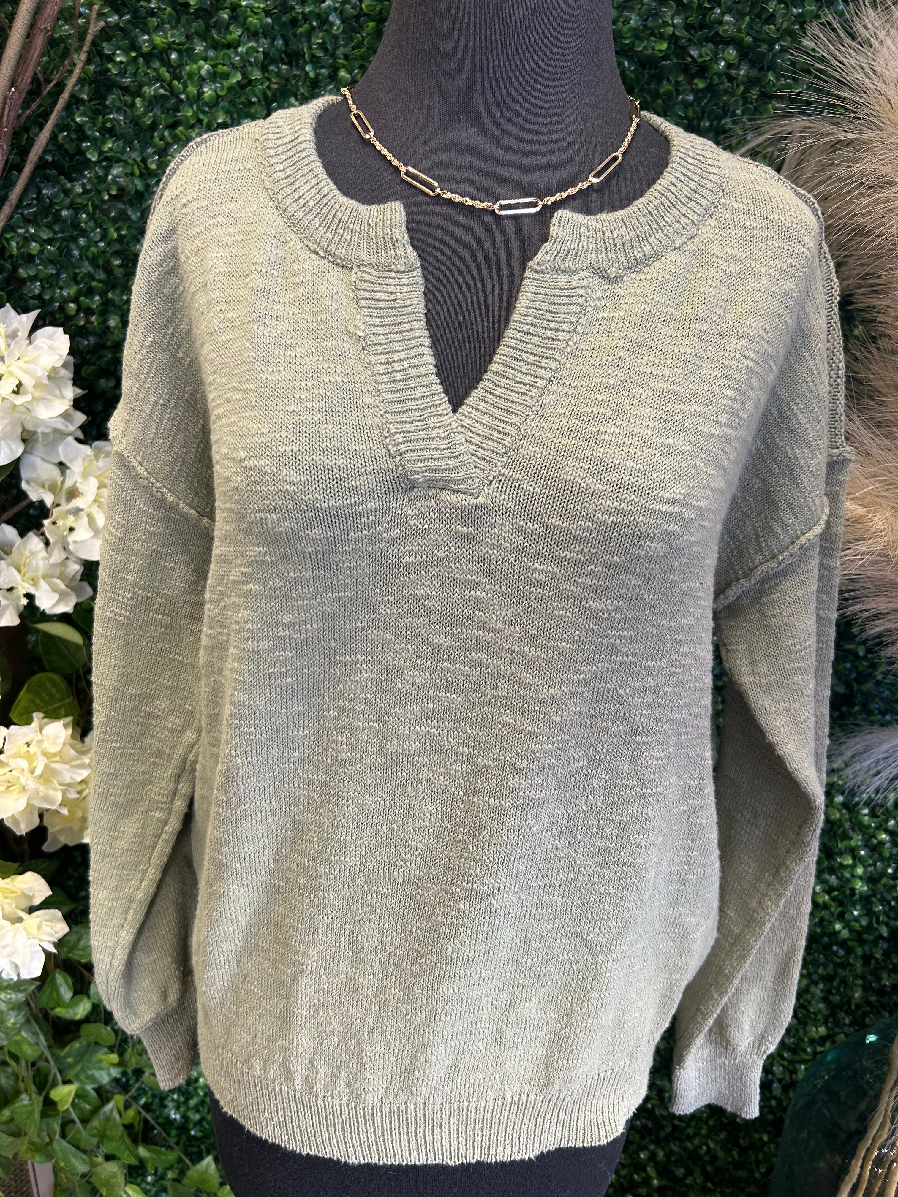 Raw Seam Henley Sweater