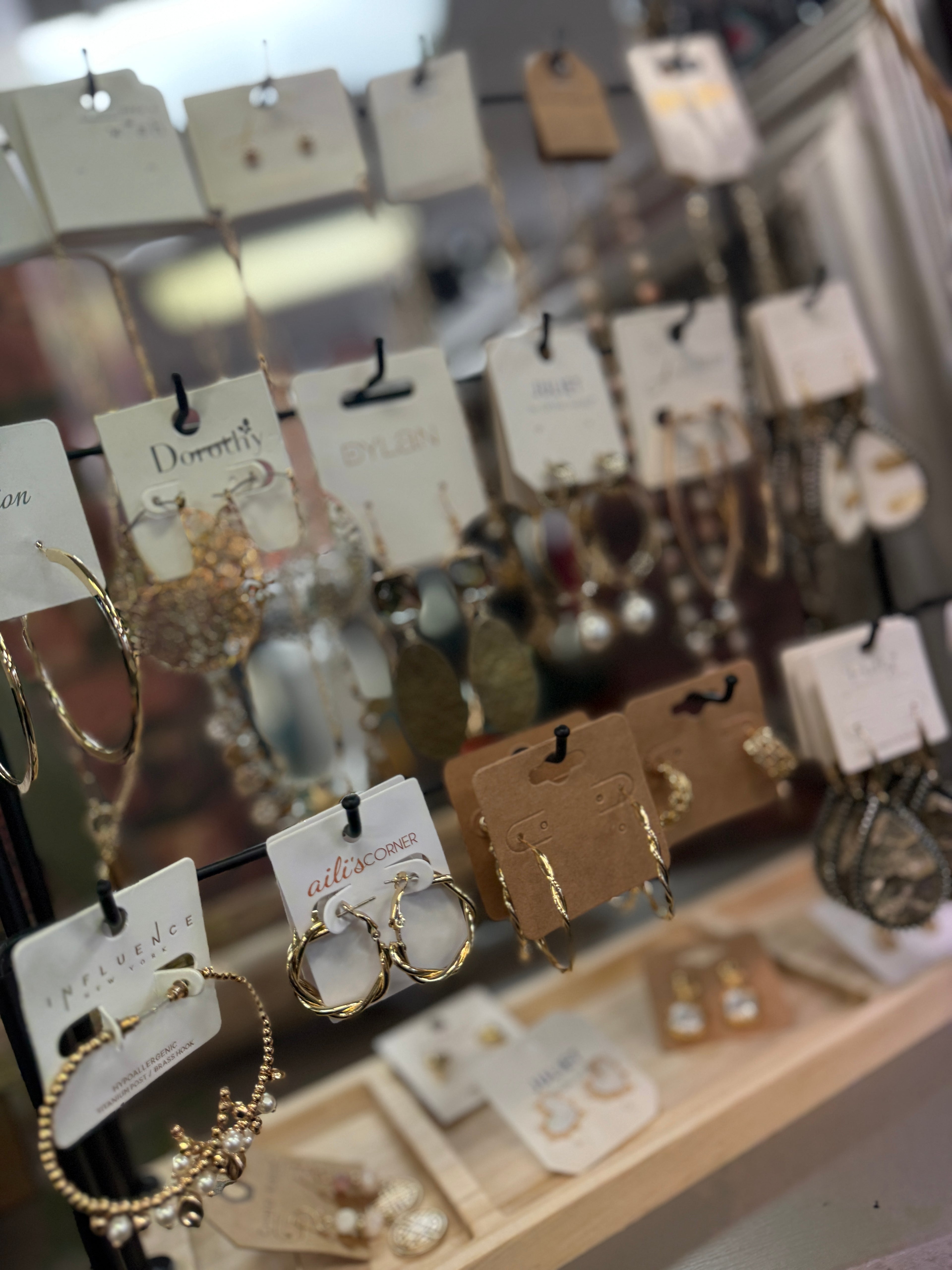 Display of stylish women's accessories boutique earrings.