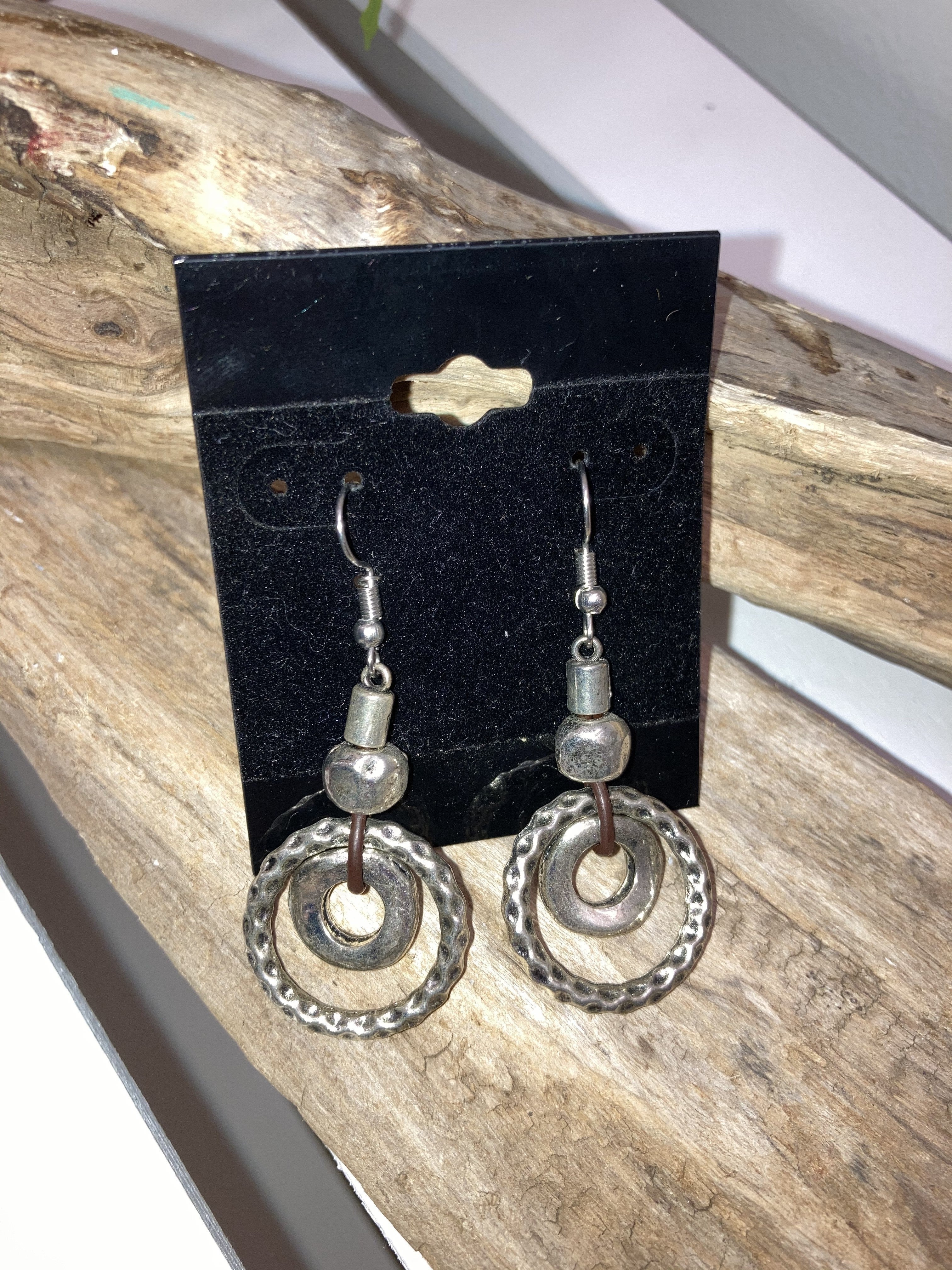 Silver circular hammered earrings