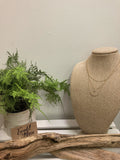 Gold triple layered necklace