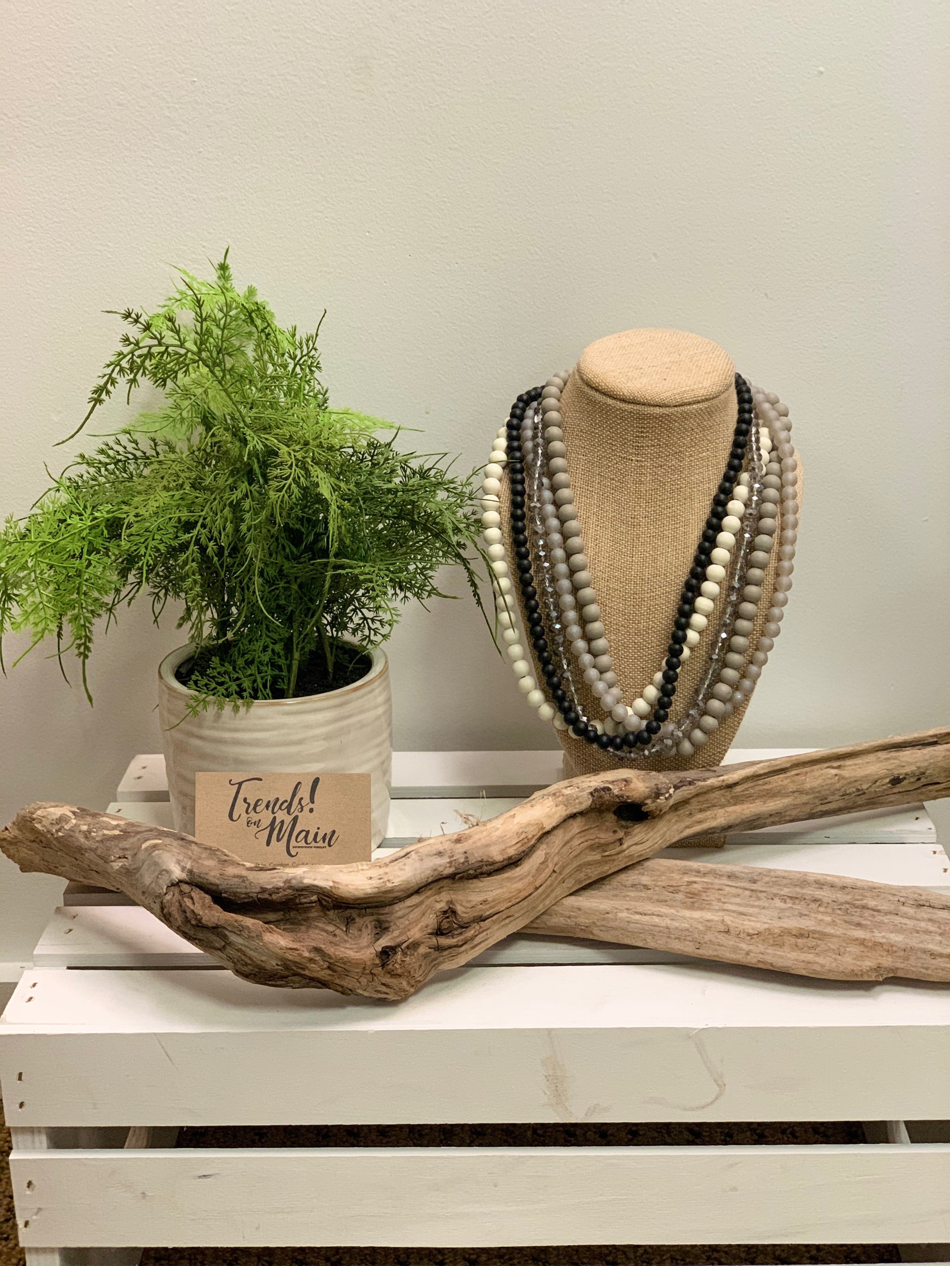 Multi-strand wood beaded necklace