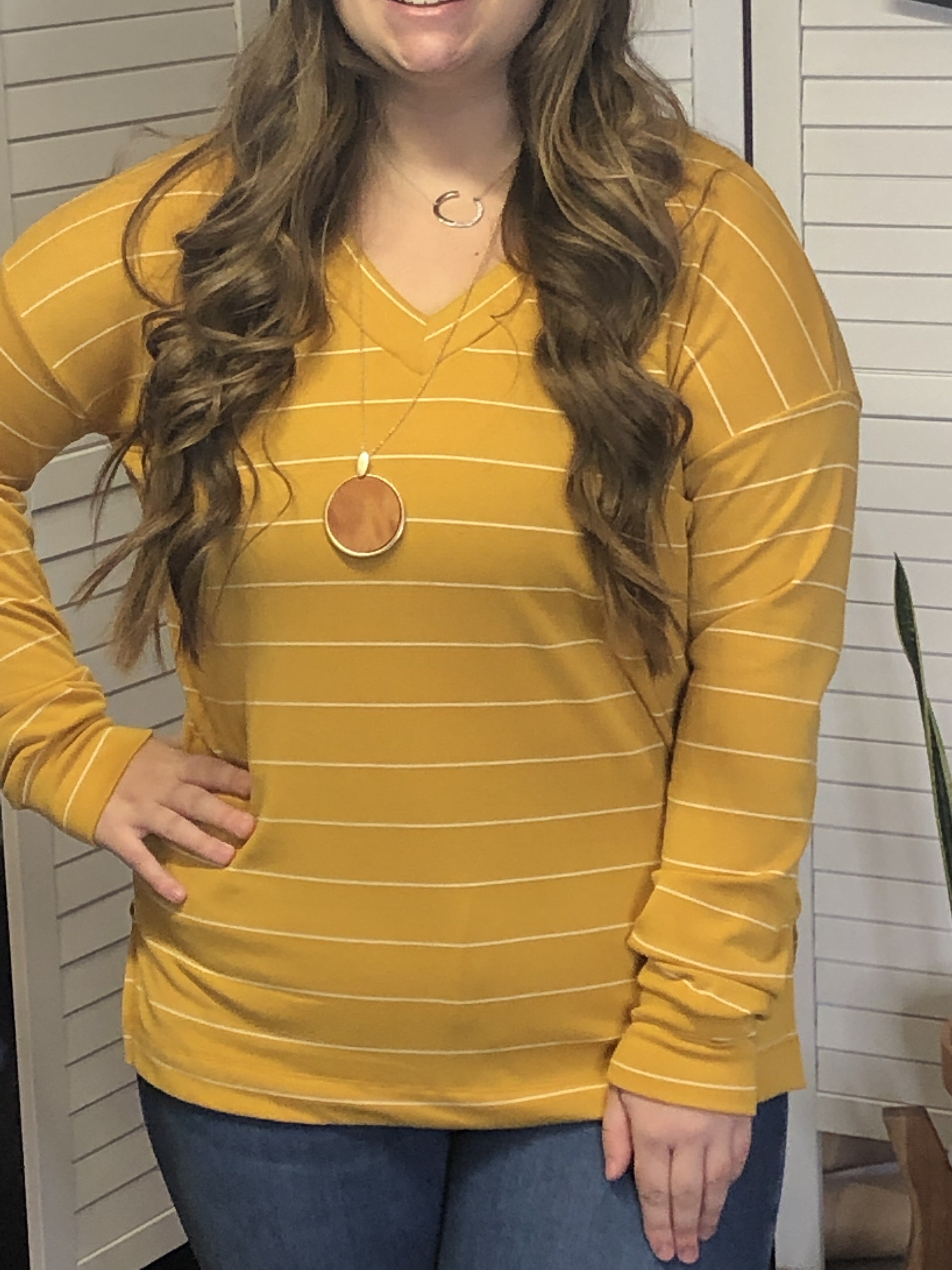 mustard striped knit v-neck  top with high-low hem