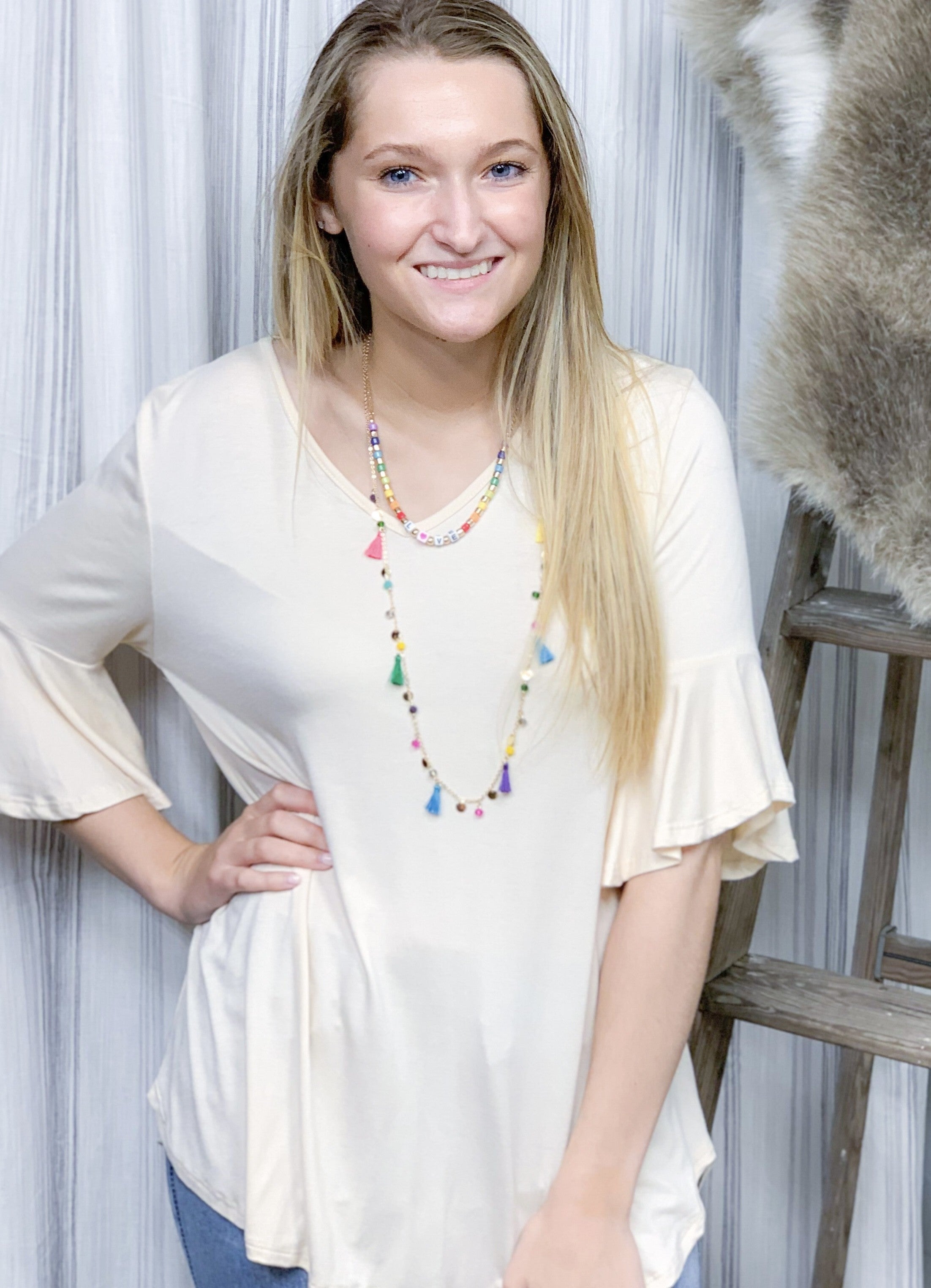 Cream Bell Sleeve Top